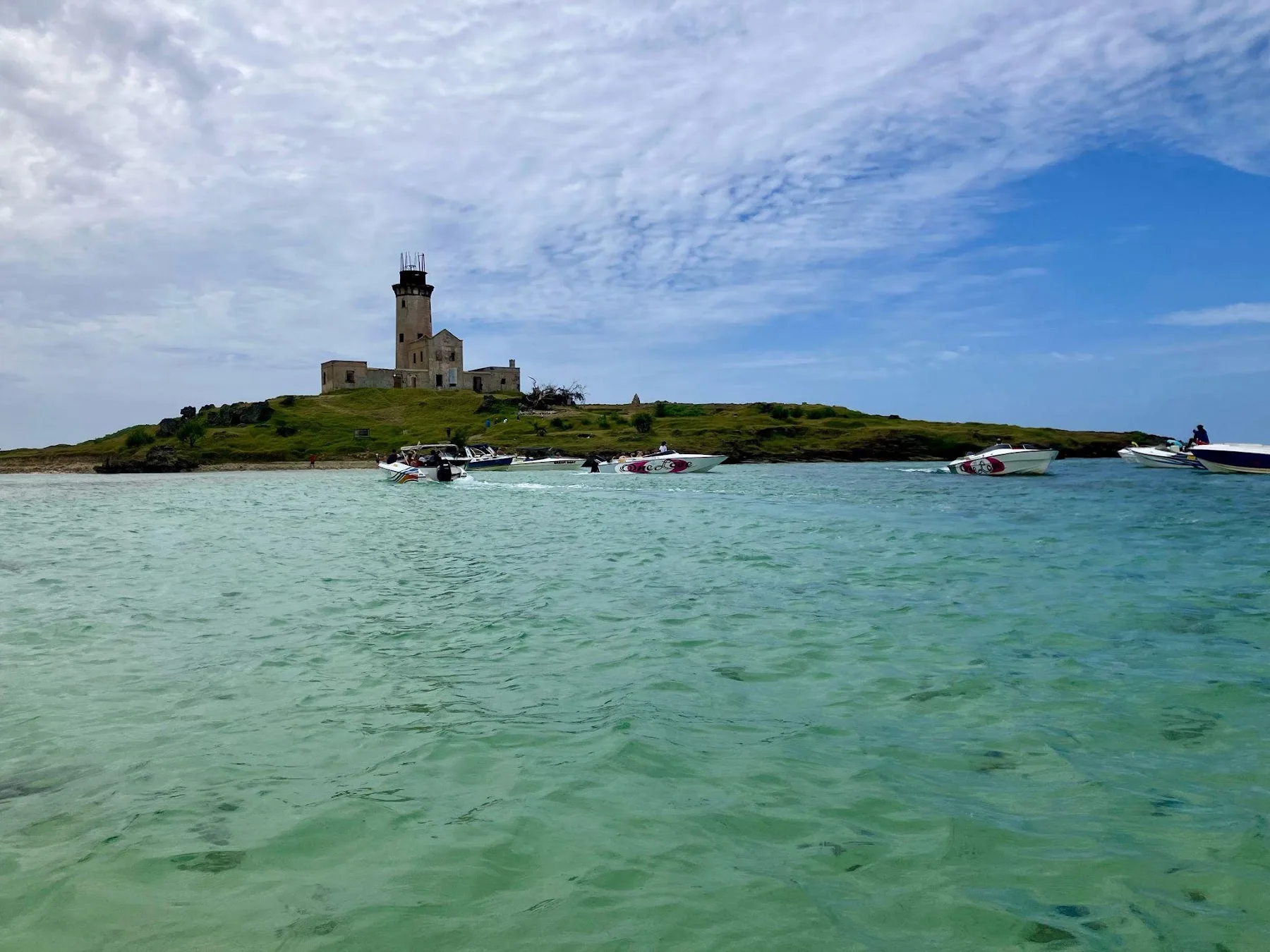 An island lighthouse seen from the lagoon
